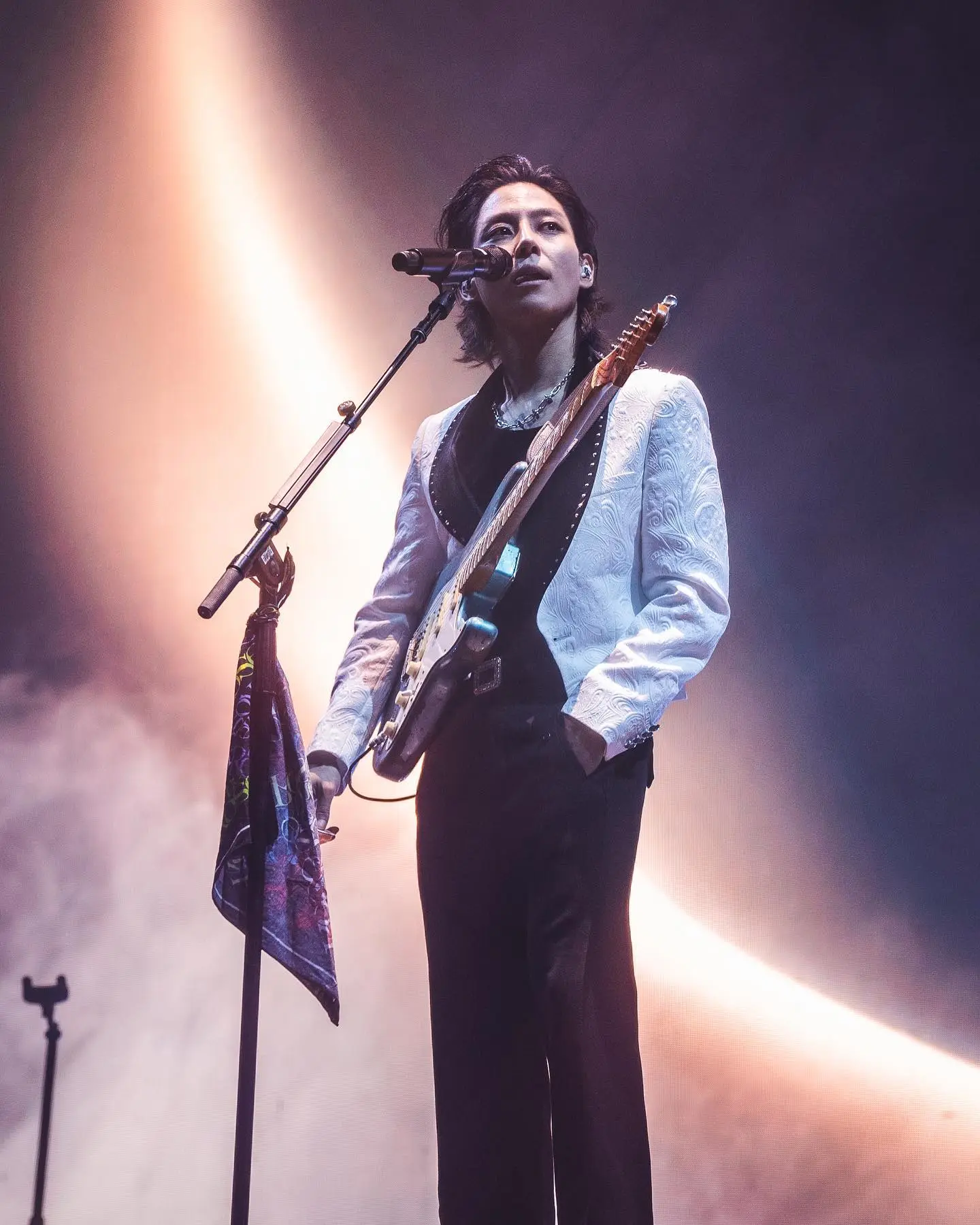 Woosung em uma das fotos de shows de kpop