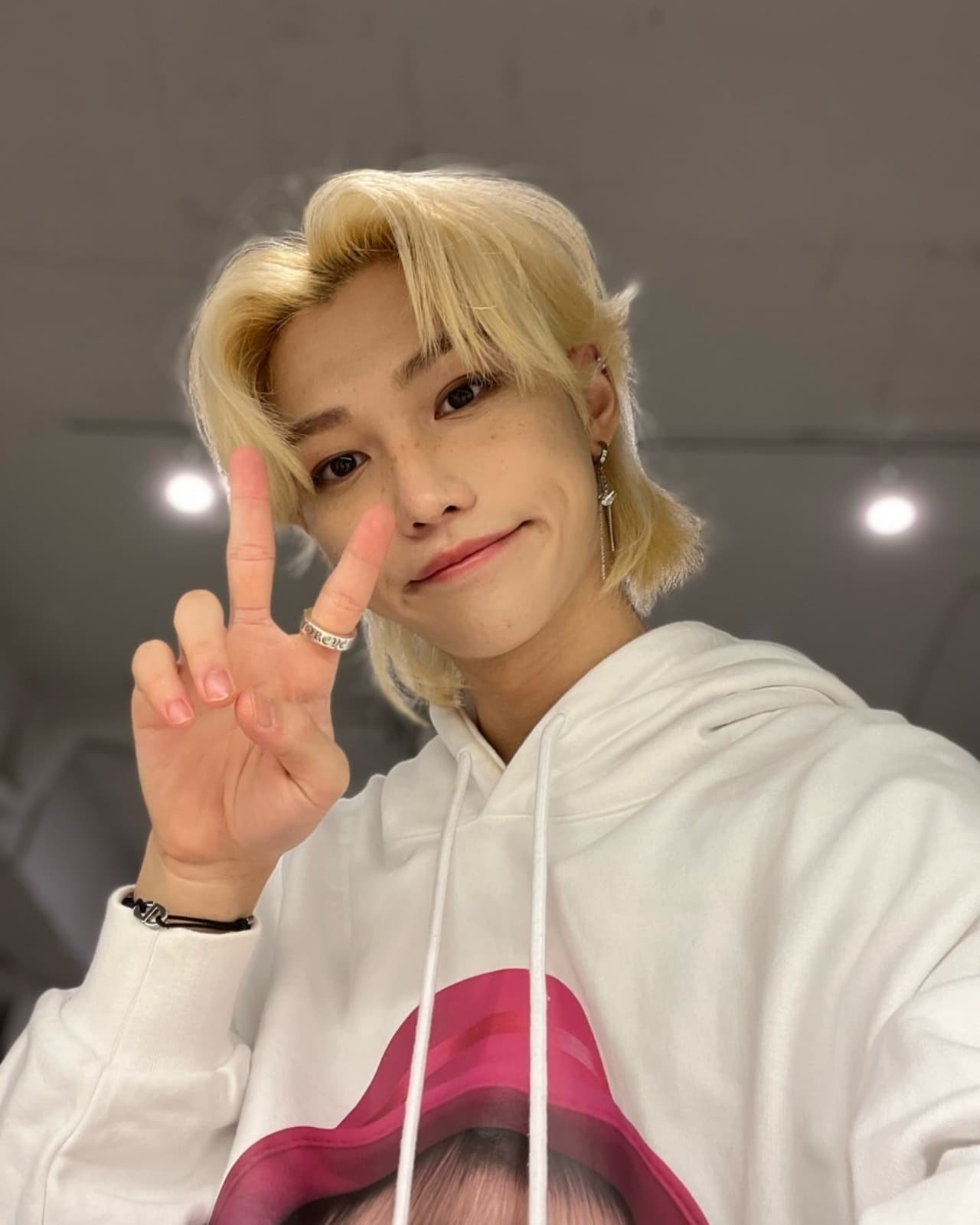 Felix, do Stray Kids, um dos idols com mullet